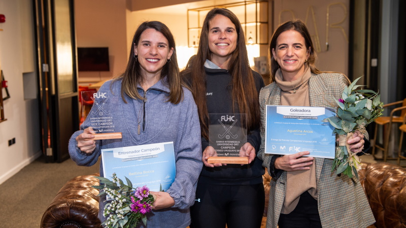 *Mariana Del Valle, Natalia Rodriguez, and Agustina Arcos receive awards from the Uruguayan Hockey Federation on behalf of Universidad ORT Uruguay