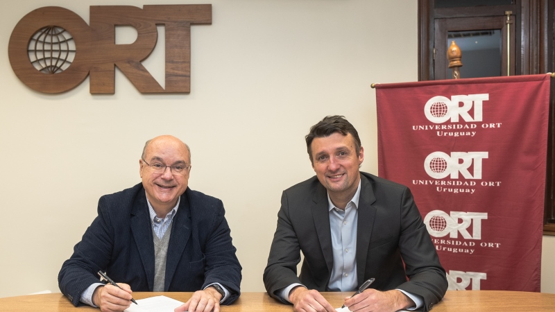 *Gaston J. Labadie, Dean of the School, and Pablo Riccheri, Managing Partner of the Cambridge Business Association (CBA)*