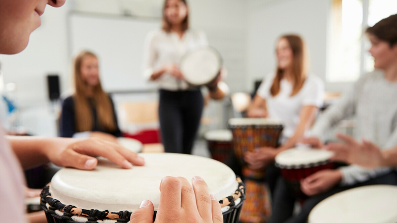 Young people playing drums