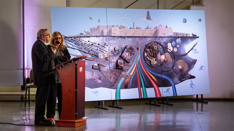 Mural titled "The Radio" by artist Roberto Cadenas