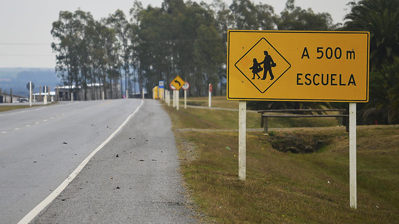 A sign along the road indicating that there is a school 500 meters ahead