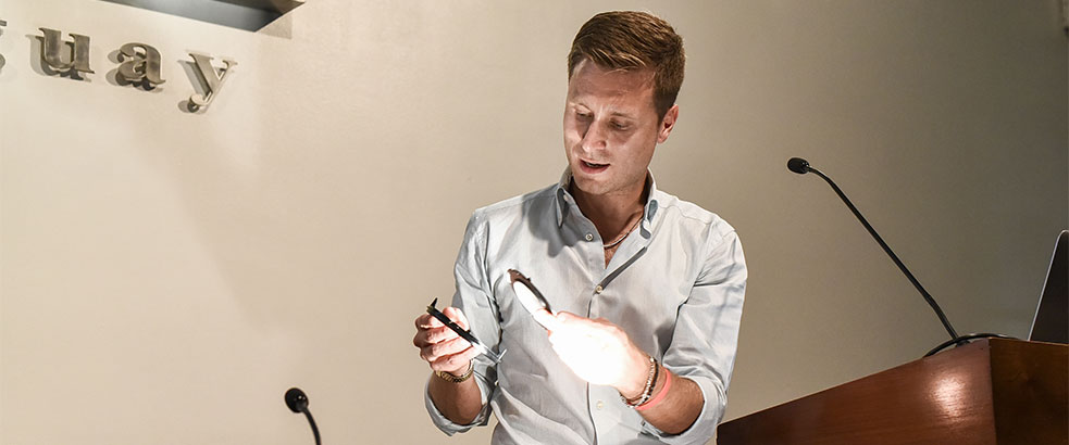 * Engineer Simone Polenta demonstrates the effect of one of the light fixtures used at the Scuola Grande di San Rocco in Venice